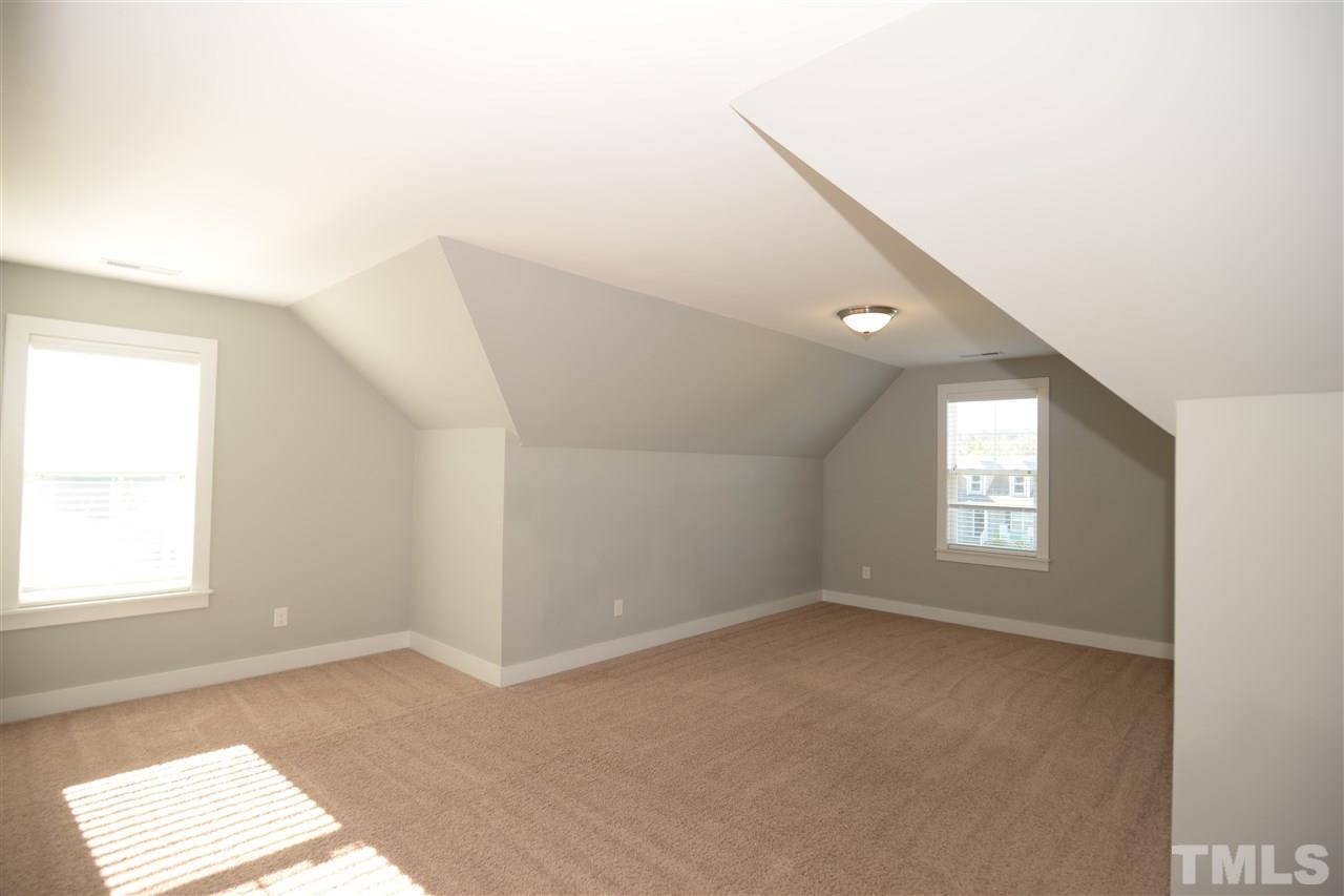 179 Red Wood Road Zebulon, NC 27597 - Photo 20 of 25 a view of empty room with windows