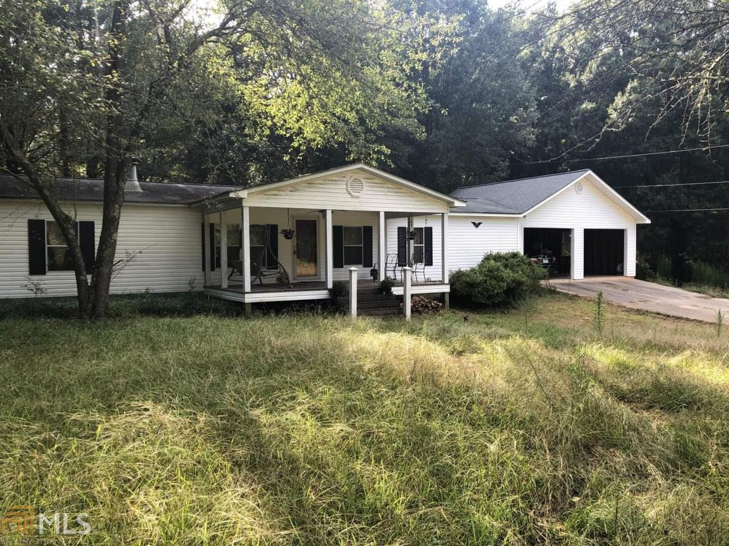589 Bearden Road Monroe, GA 30655 - Photo 1 of 1 a view of a house with pool yard and furniture