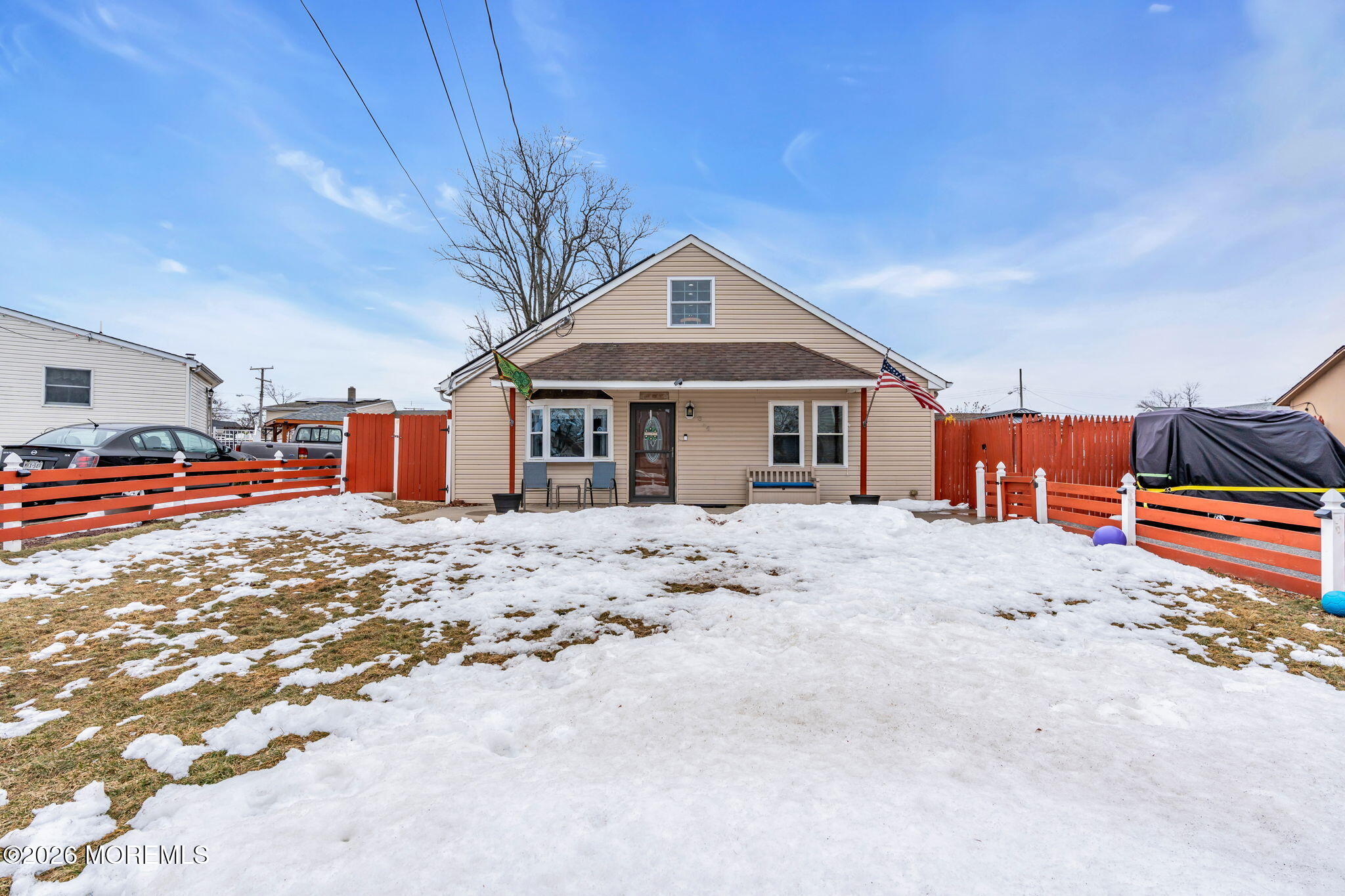 824 5th Street Union Beach, NJ 07735 - Photo 2 of 32 a front view of a house with large trees