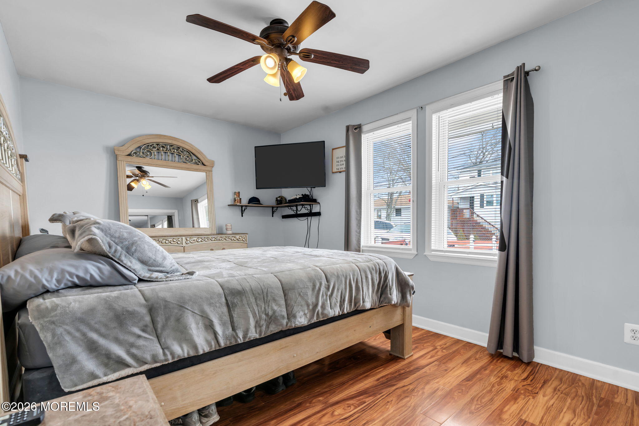 824 5th Street Union Beach, NJ 07735 - Photo 21 of 32 a living room with a bed furniture and a large window