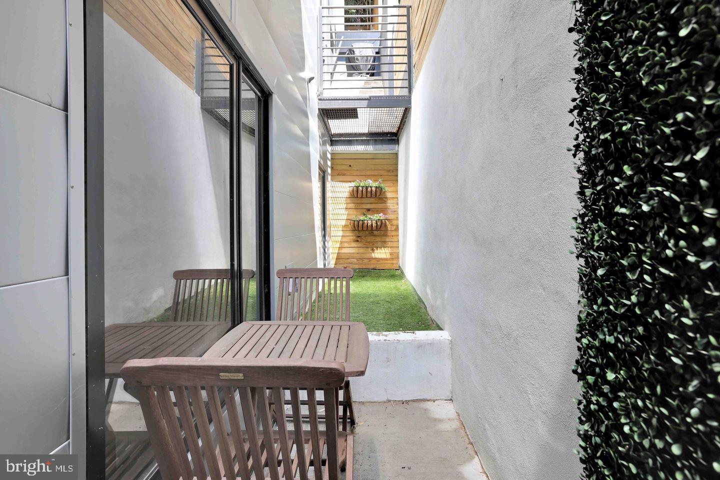 1469 Florida Avenue Northwest, Unit 2 Washington, DC 20009 - Photo 9 of 11 Charming outdoor space for relaxation.