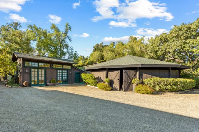 a view of outdoor space with deck and entertaining space