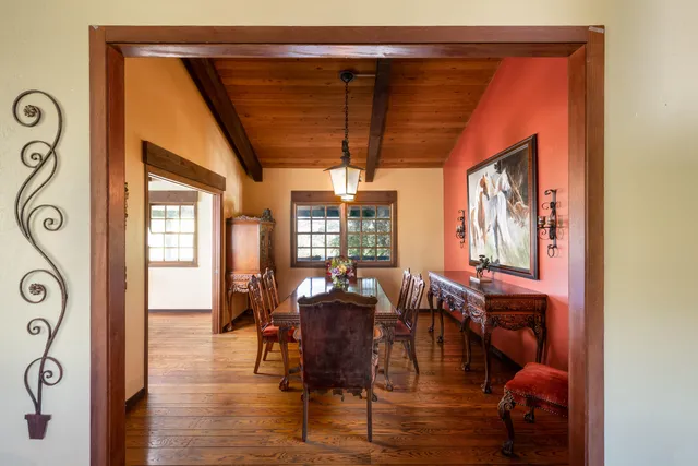 a view of a dining room with furniture window and outside view