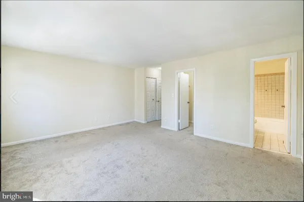 an empty room with a natural light