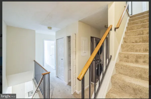 a view of an entryway with staircase