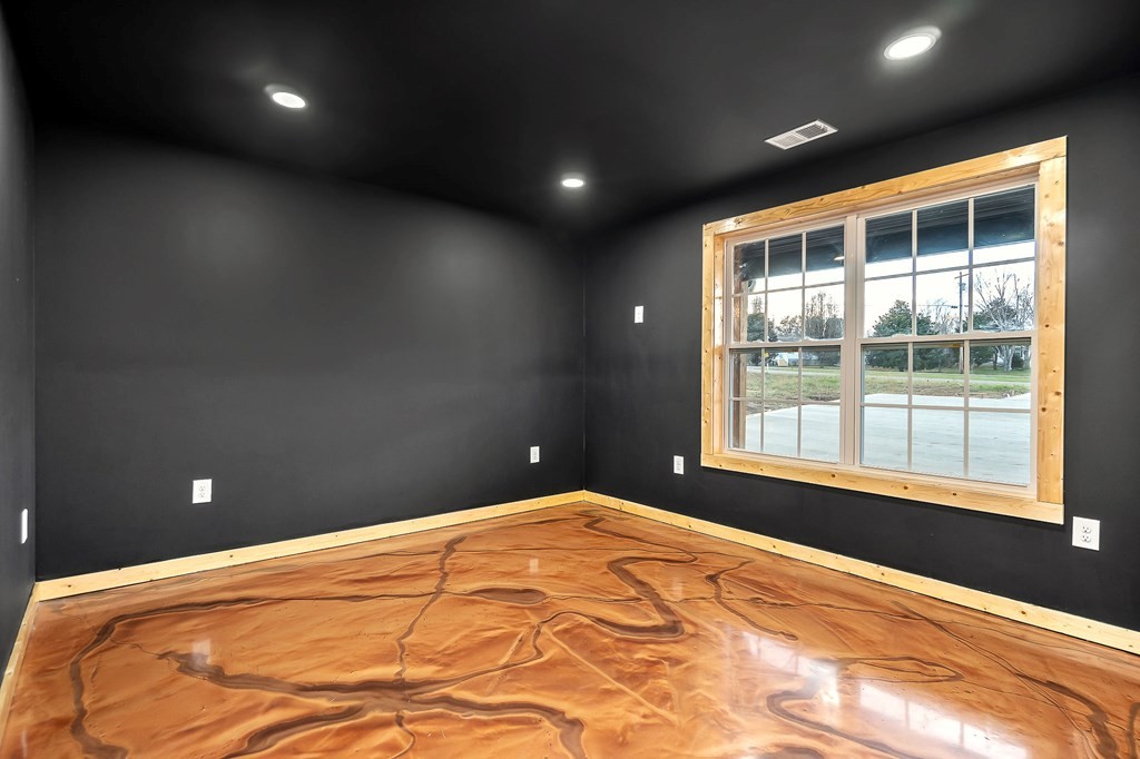 120 Joshua Road Cookeville, TN 38501 - Photo 12 of 21 a bedroom with a large bed and a large window