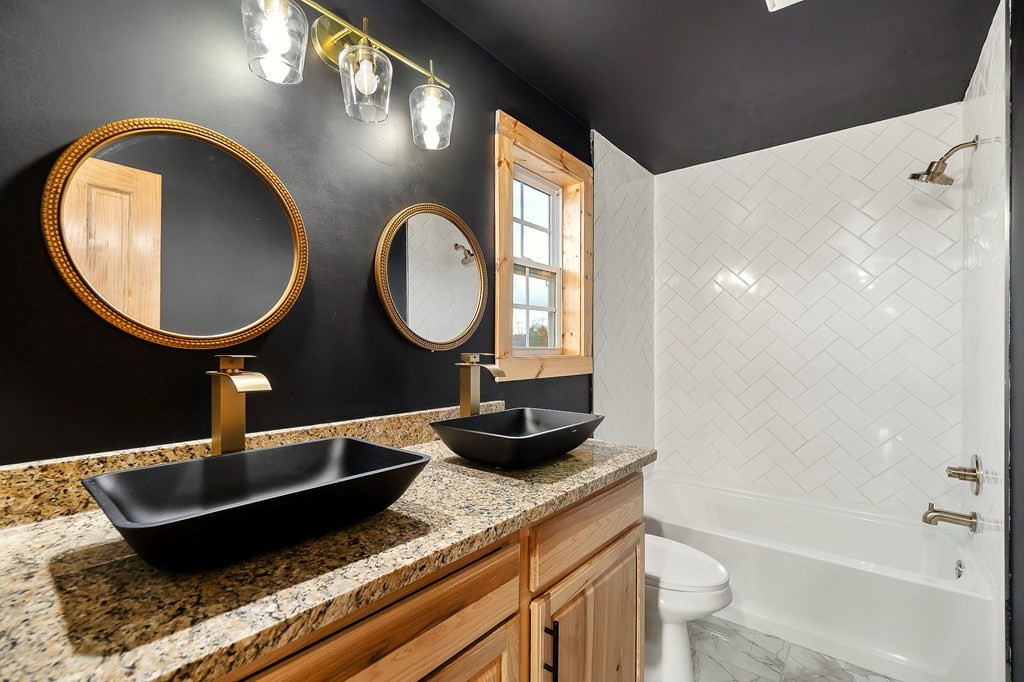 120 Joshua Road Cookeville, TN 38501 - Photo 16 of 21 a bathroom with a granite countertop double vanity sink and a mirror