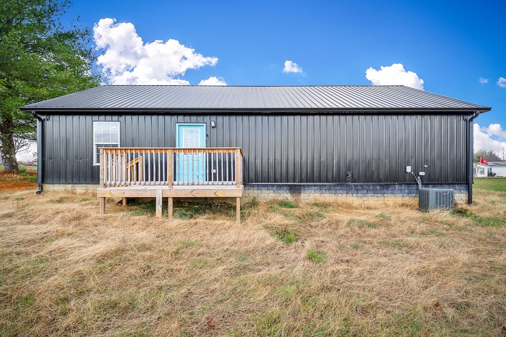 120 Joshua Road Cookeville, TN 38501 - Photo 21 of 21 a view of a backyard with a garden