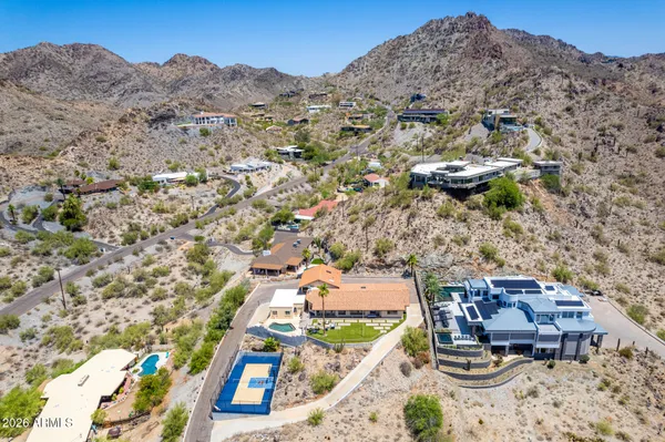 an aerial view of residential house with outdoor space
