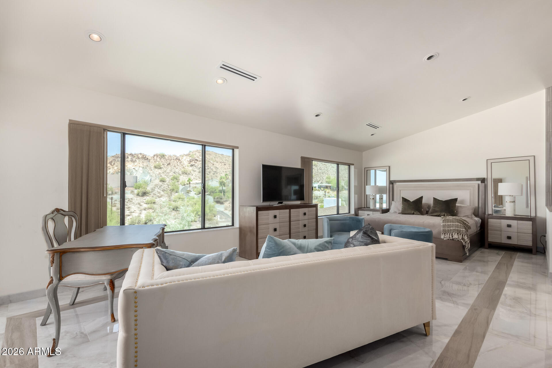 6526 North 37th Street Phoenix, AZ 85018 - Photo 22 of 51 a living room with furniture and a flat screen tv