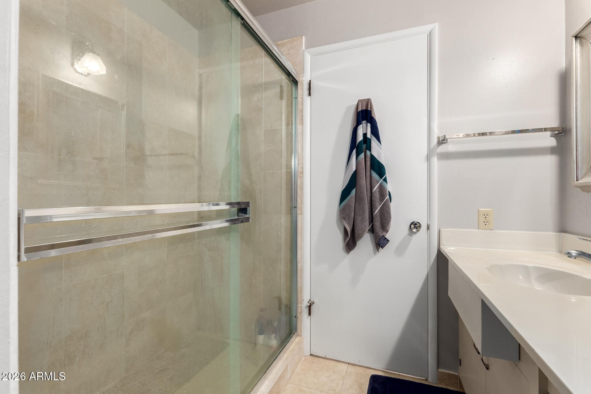 6526 North 37th Street Phoenix, AZ 85018 - Photo 34 of 51 a bathroom with a sink and mirror