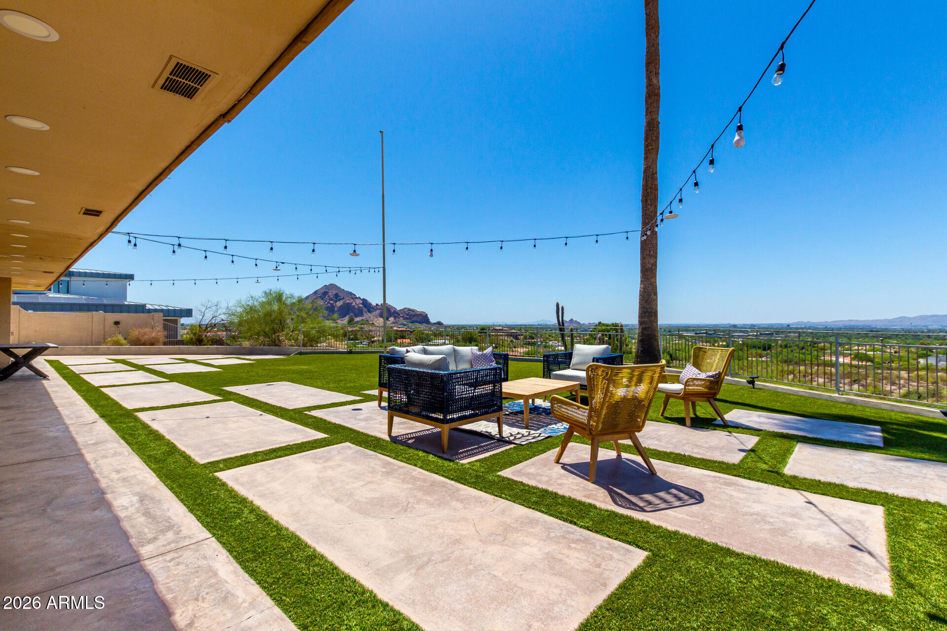 6526 North 37th Street Phoenix, AZ 85018 - Photo 44 of 51 a view of a terrace with chairs