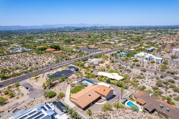 an aerial view of a city with lots of residential buildings