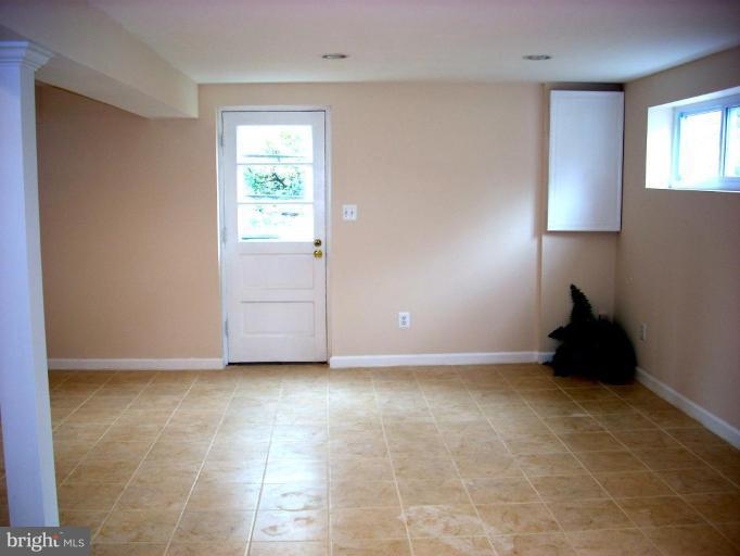 8715 Clydesdale Road Springfield, VA 22151 - Photo 18 of 19 a view of an empty room with a window