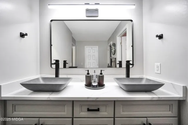 a kitchen with sink and window