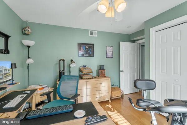 a view of a workspace with furniture