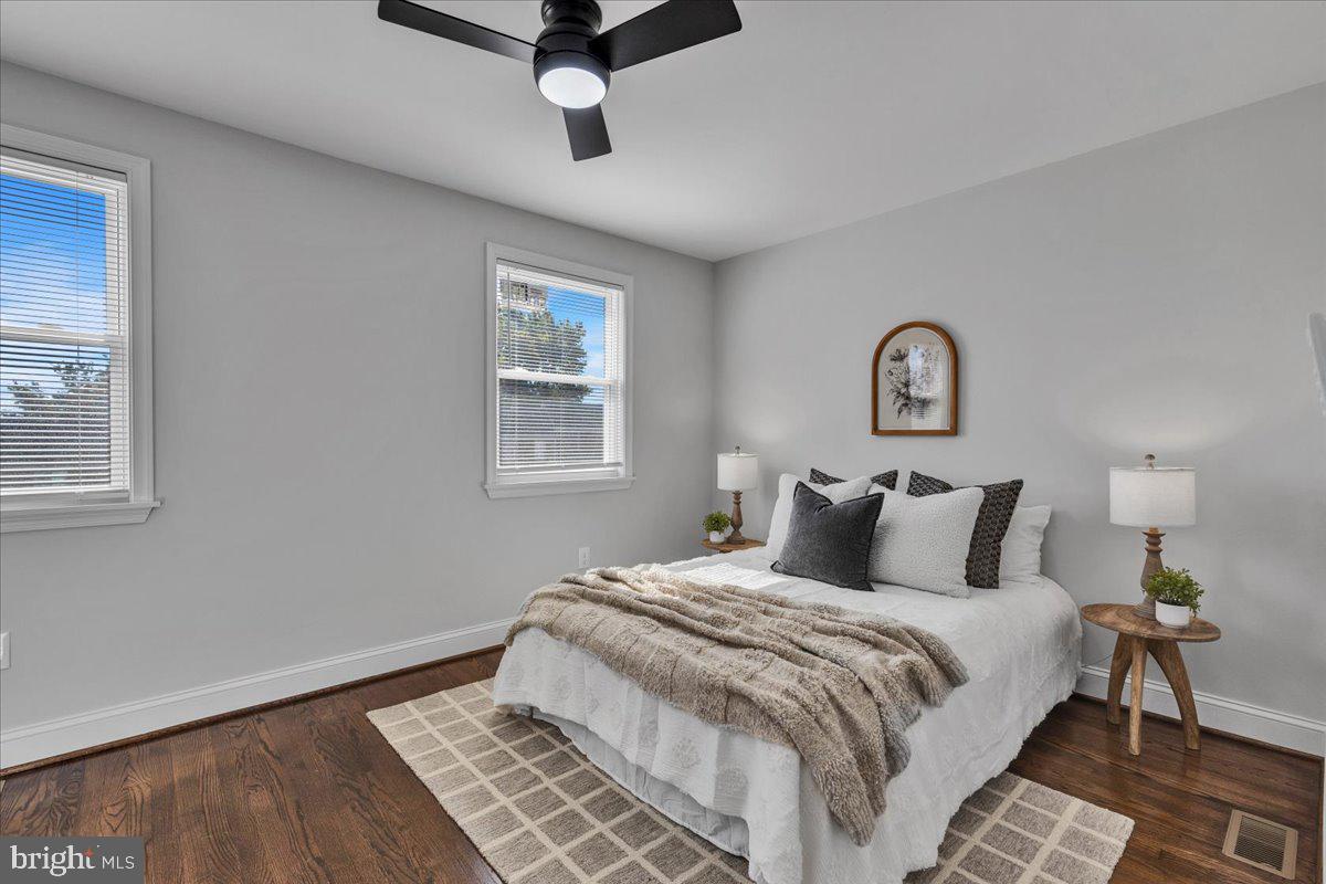 3908 Rokeby Road Baltimore, MD 21229 - Photo 11 of 28 a bedroom with a bed and a window
