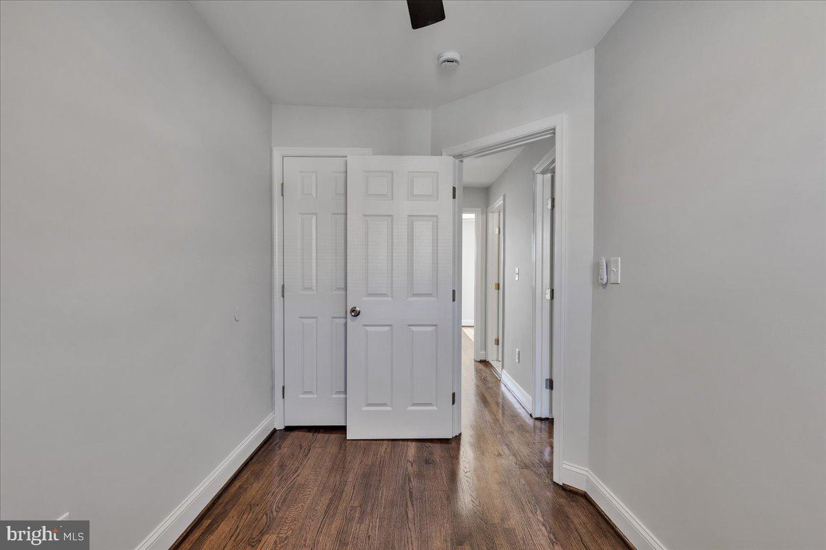 3908 Rokeby Road Baltimore, MD 21229 - Photo 20 of 28 a view of a hallway with wooden floor