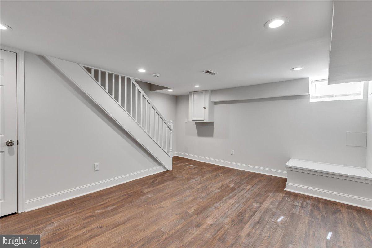 3908 Rokeby Road Baltimore, MD 21229 - Photo 23 of 28 a view of entryway with stairs and wooden floor