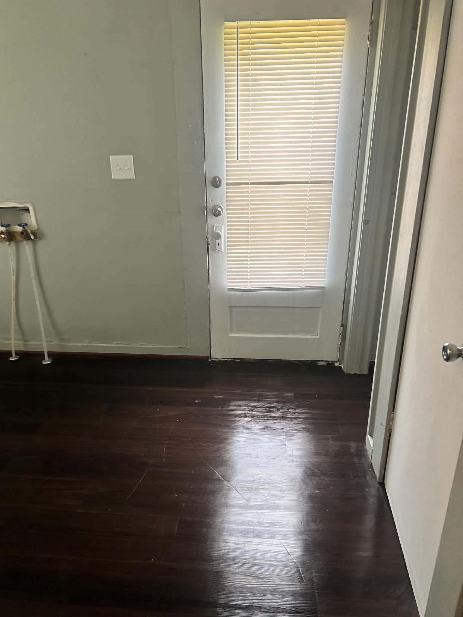 11 Smith Street Shepherd, TX 77371 - Photo 13 of 31 a view of a room with wooden floor and a window