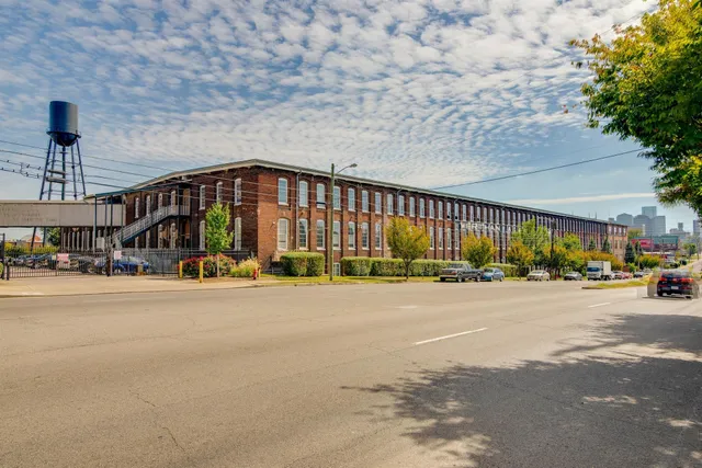 a view of a building with a street