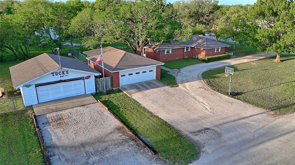 522 Montague Street Nocona, TX 76255 - Photo 15 of 25 an aerial view of a house with a yard