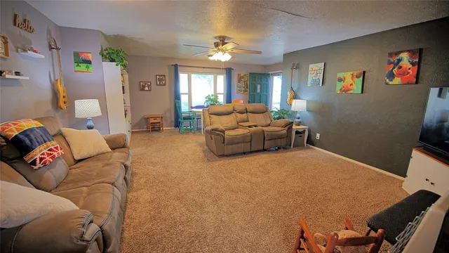 a bedroom with furniture and a chandelier