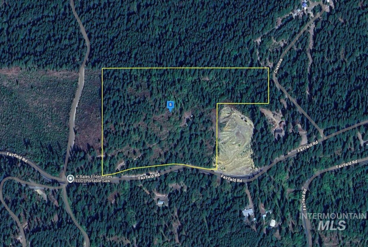 Aerial overview of property's location featuring property parcel outlined