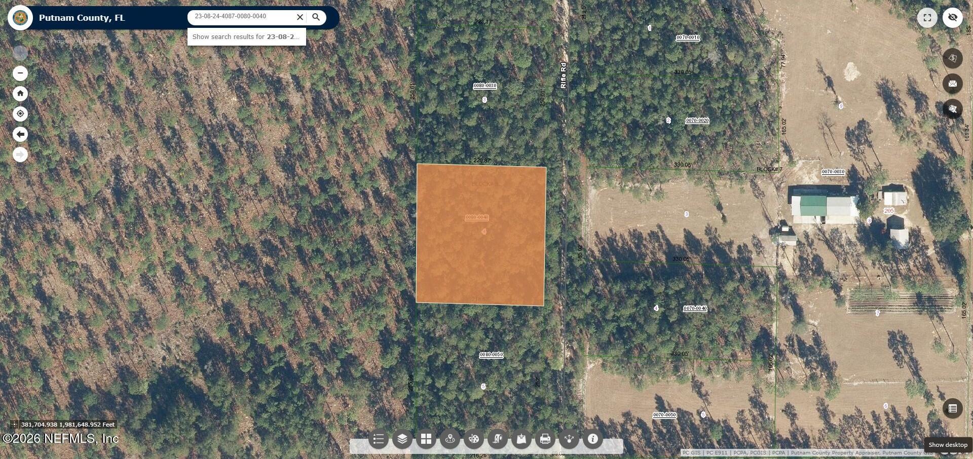 215 Rifle Road Florahome, FL 32140 - Photo 7 of 13 a view of outdoor space and street