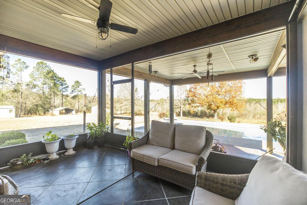 4065 Gordon Road Abbeville, GA 31001 - Photo 35 of 48 a living room with furniture and a large window