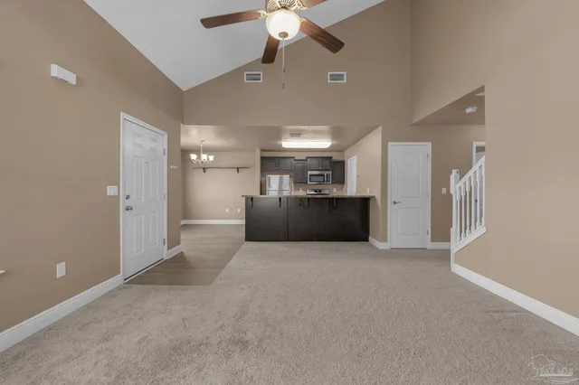 a view of a kitchen with a sink and a kitchen