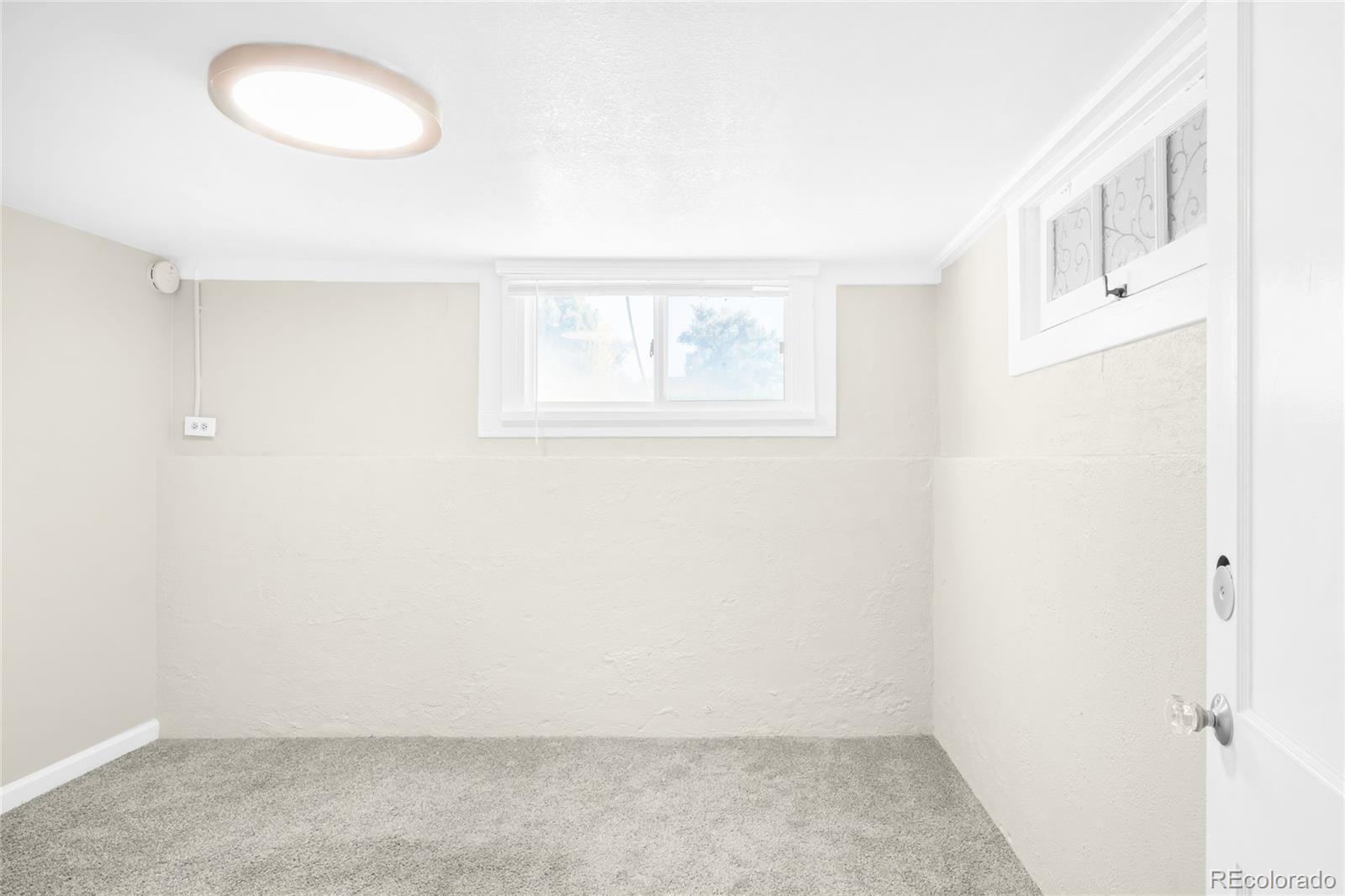 3535 High Court Wheat Ridge, CO 80033 - Photo 16 of 26 an empty room with windows