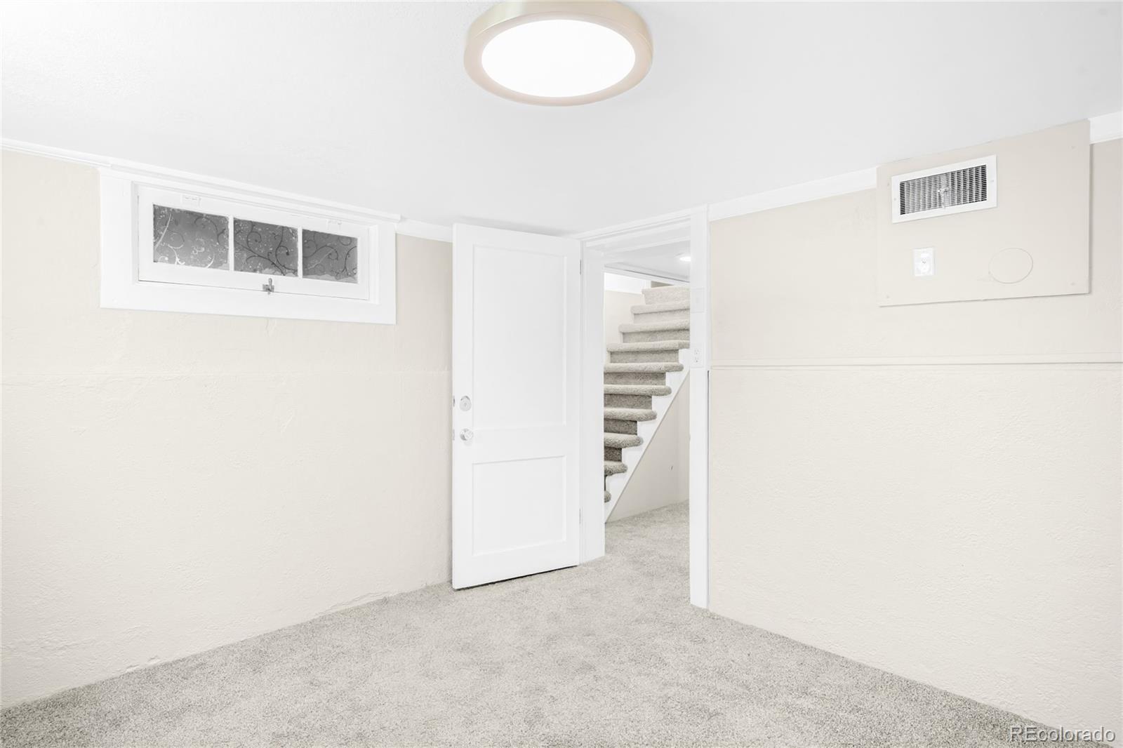 3535 High Court Wheat Ridge, CO 80033 - Photo 17 of 26 a view of a livingroom with an empty space