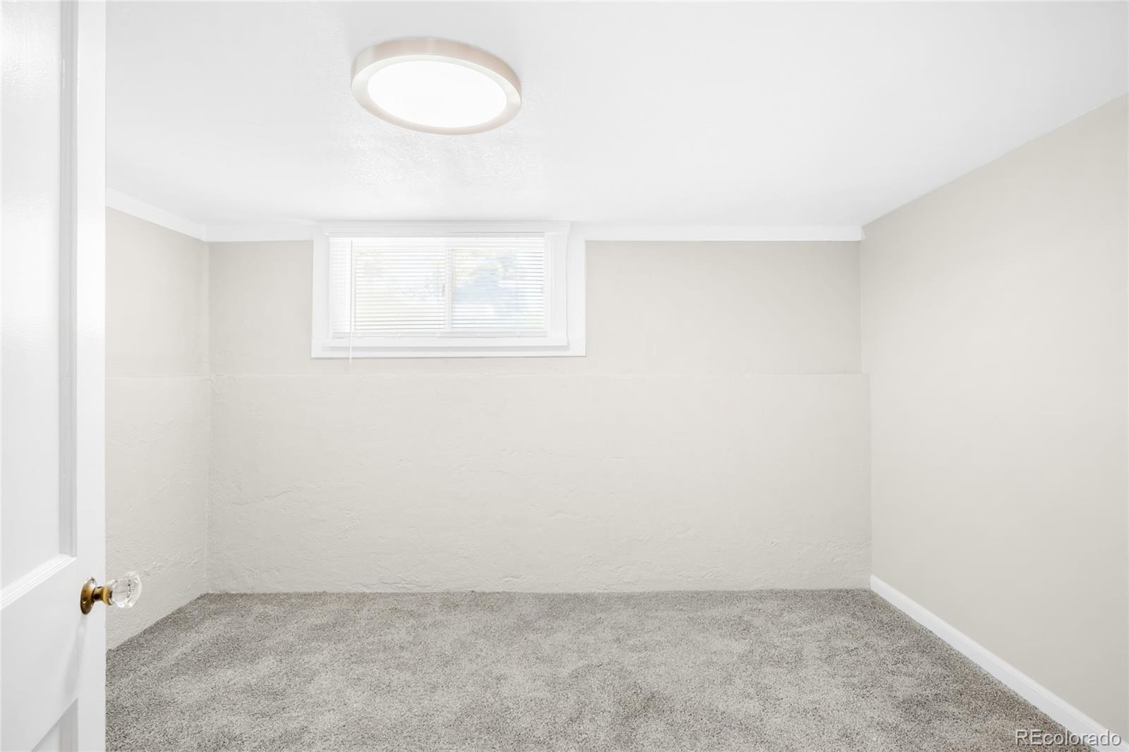 3535 High Court Wheat Ridge, CO 80033 - Photo 18 of 26 an empty room with a window