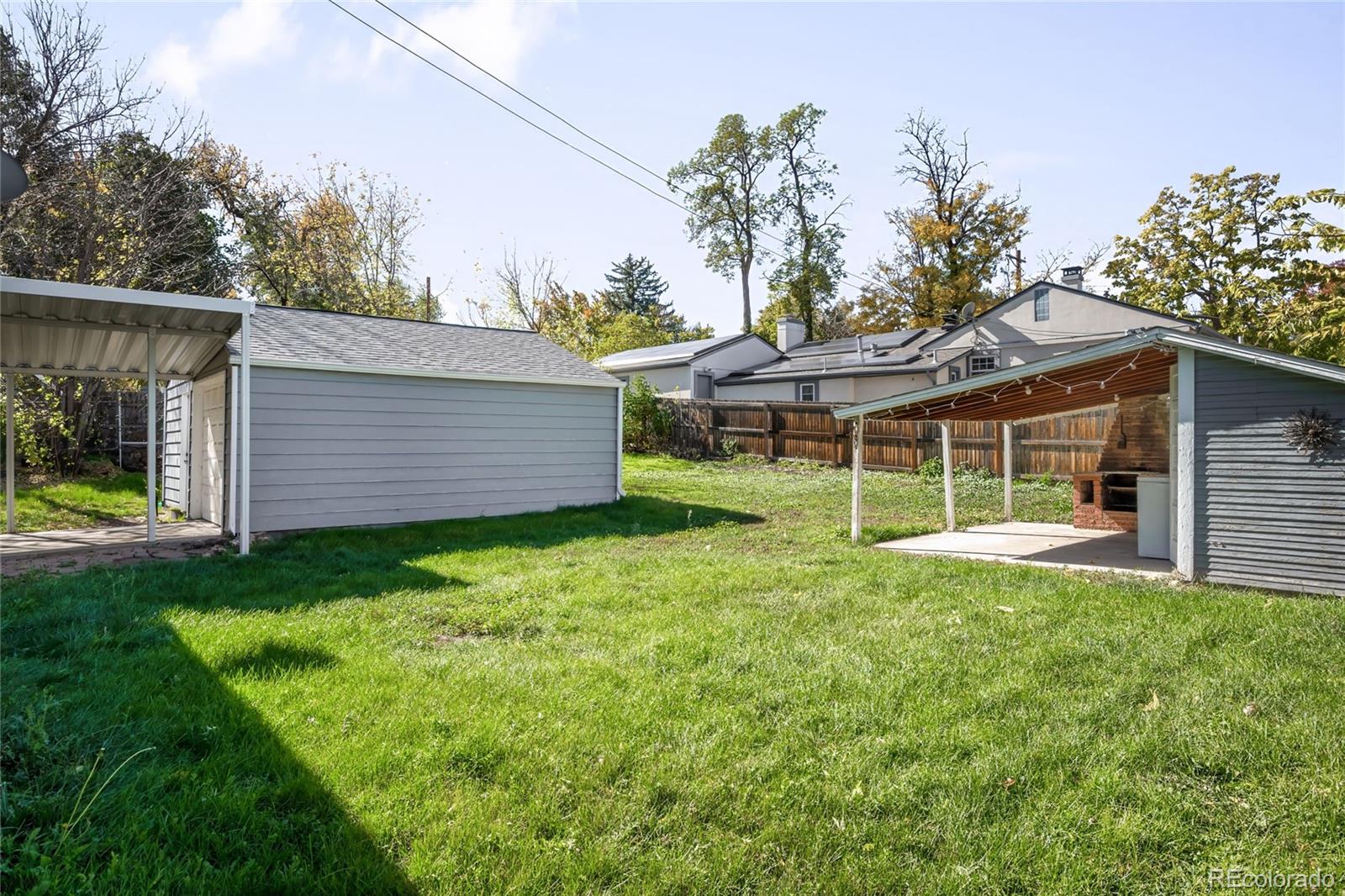 3535 High Court Wheat Ridge, CO 80033 - Photo 23 of 26 a view of a house with backyard and sitting area