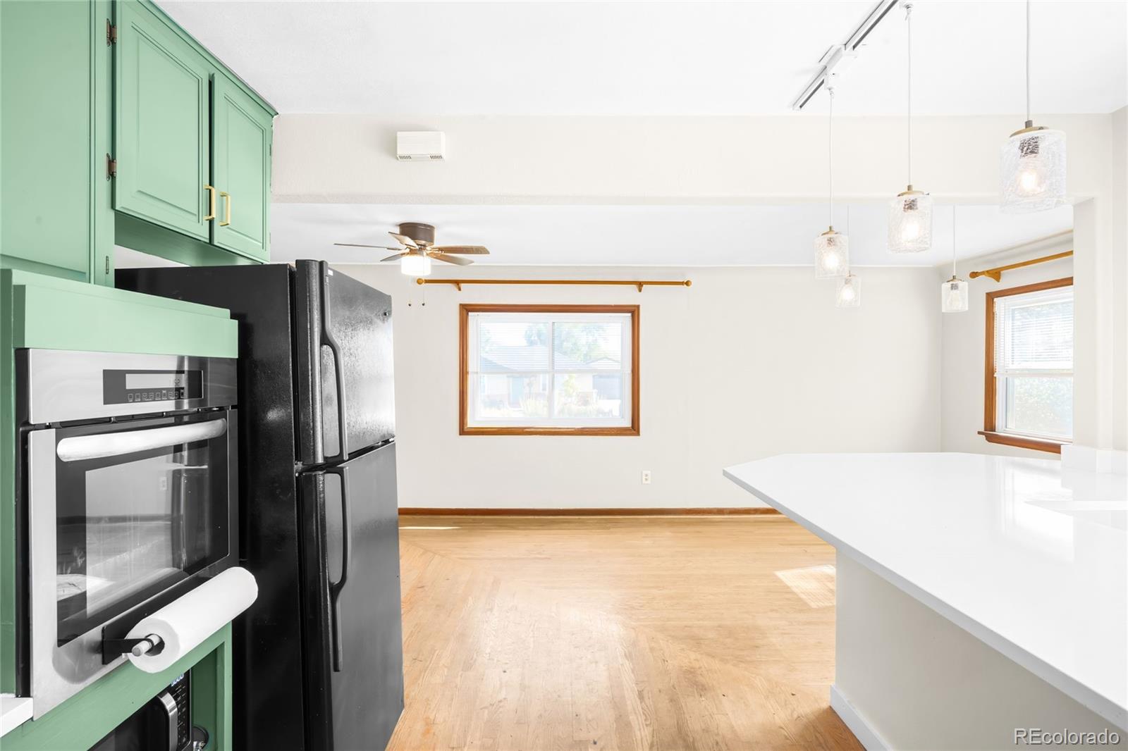 3535 High Court Wheat Ridge, CO 80033 - Photo 8 of 26 a kitchen with stainless steel appliances a refrigerator and a stove
