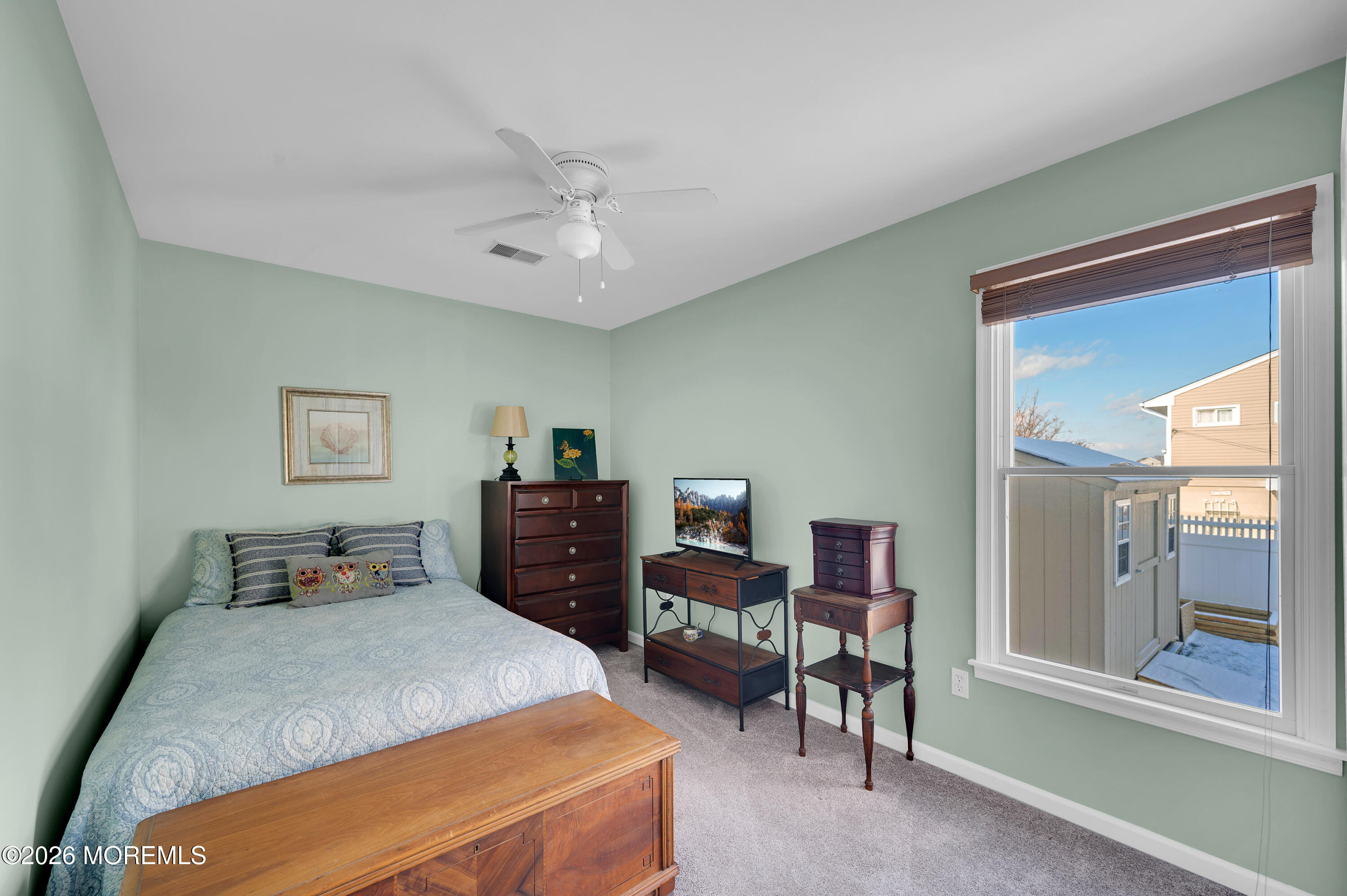 317 Carter Avenue Point Pleasant Beach, NJ 08742 - Photo 39 of 49 a bedroom with a bed and furniture