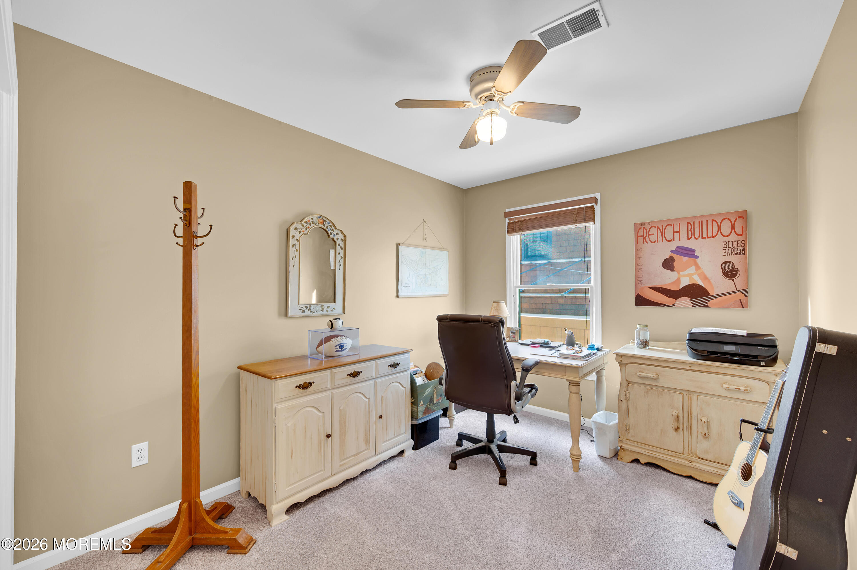 317 Carter Avenue Point Pleasant Beach, NJ 08742 - Photo 40 of 49 a view of a workspace with furniture and a window