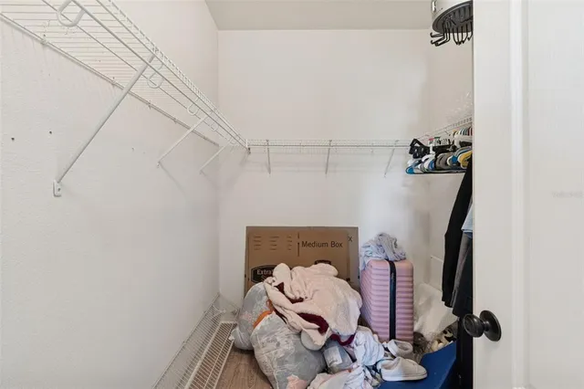 an aerial view of residential houses with outdoor space and river