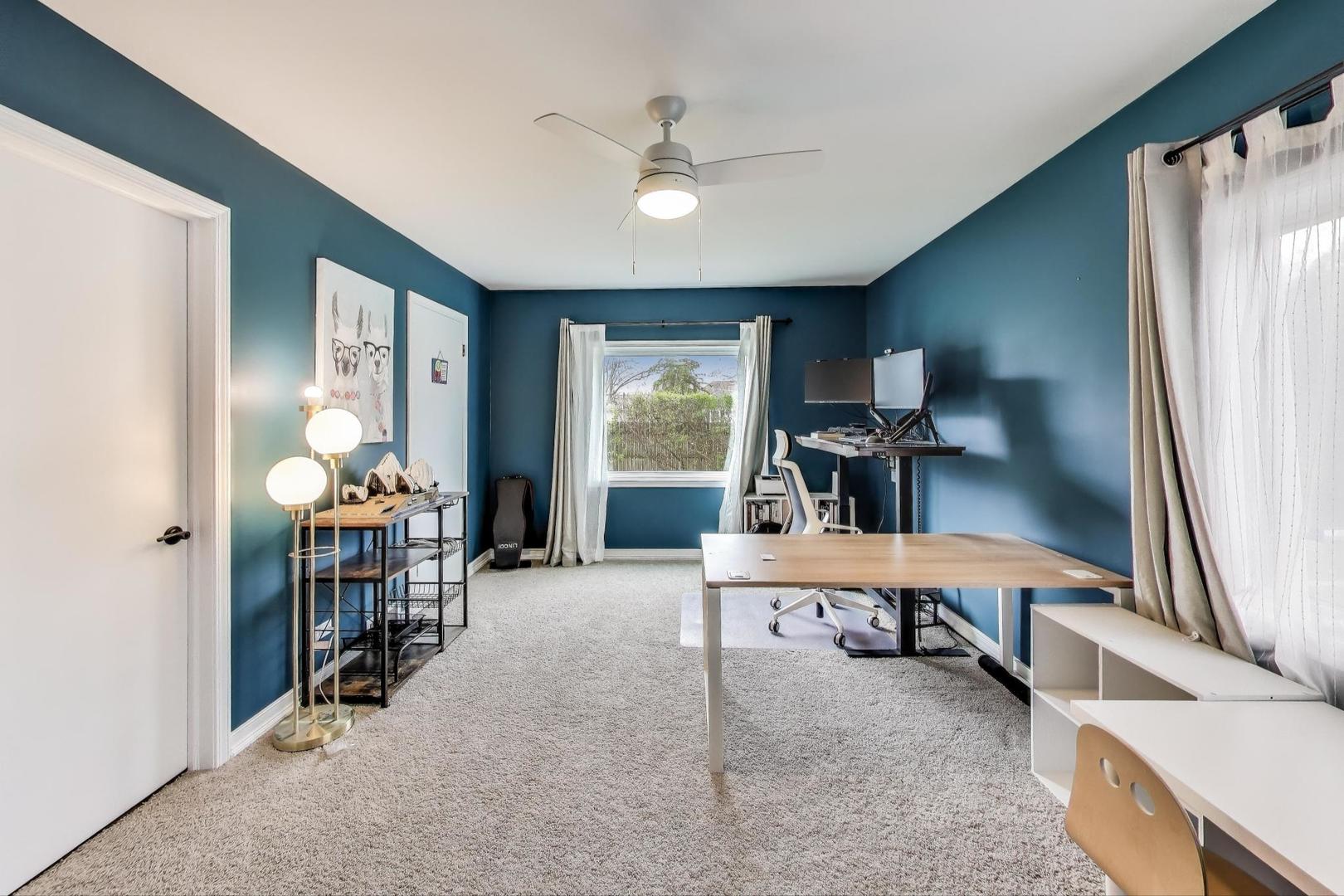 1344 Southwind Drive Northbrook, IL 60062 - Photo 17 of 39 a room with furniture and a window