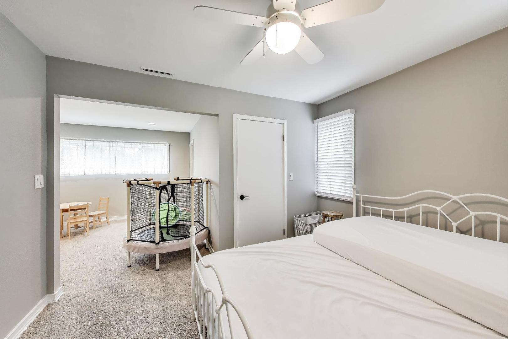 1344 Southwind Drive Northbrook, IL 60062 - Photo 22 of 39 a bedroom with a bed and a mirror
