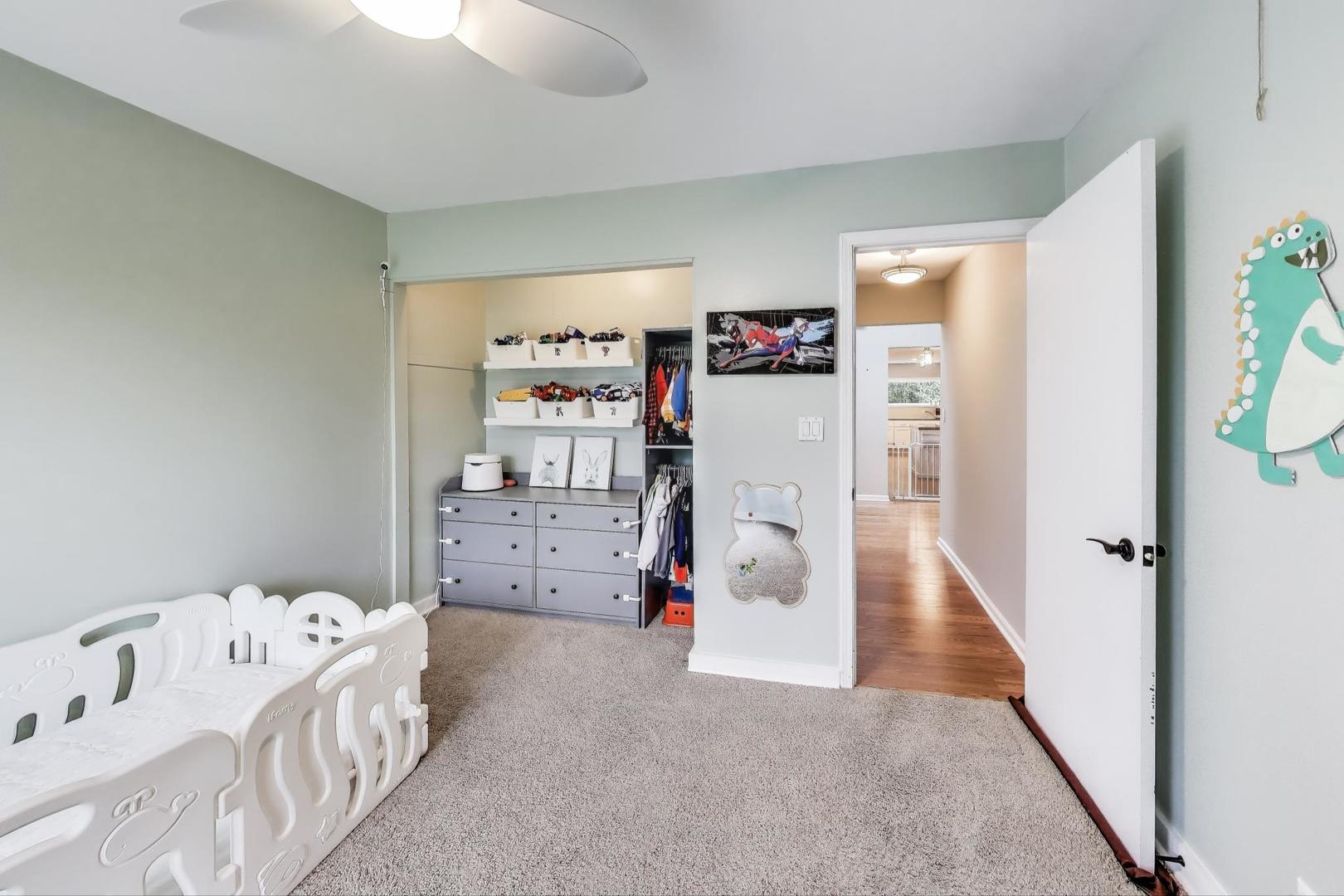 1344 Southwind Drive Northbrook, IL 60062 - Photo 25 of 39 a view of livingroom with baby crib