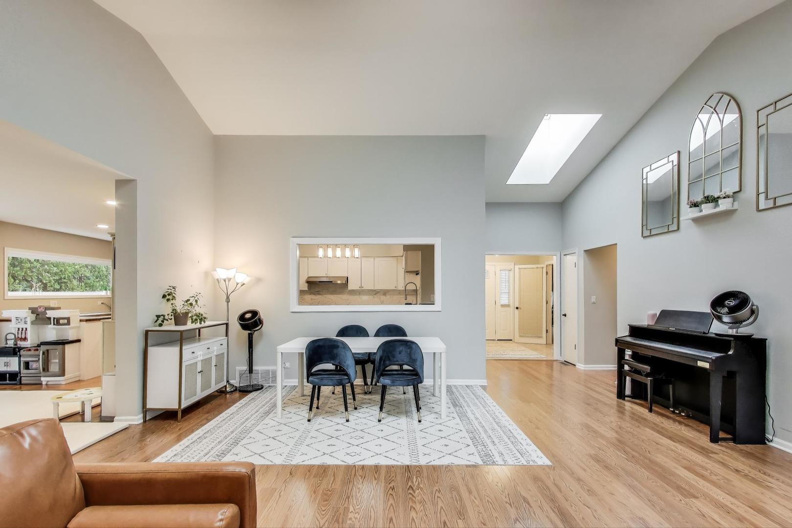 1344 Southwind Drive Northbrook, IL 60062 - Photo 9 of 39 a living room with furniture and wooden floor