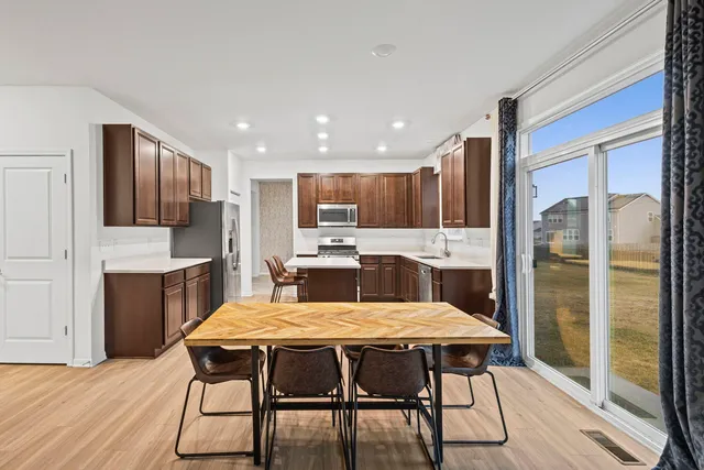 a view of an empty room with windows