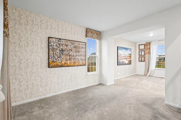 a view of a house with backyard and garden