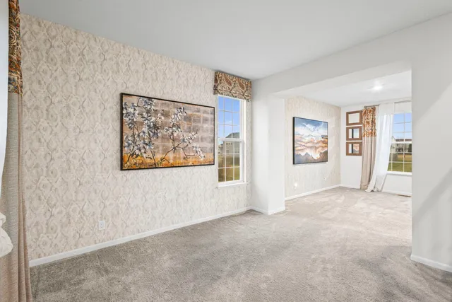 a view of a house with backyard and garden