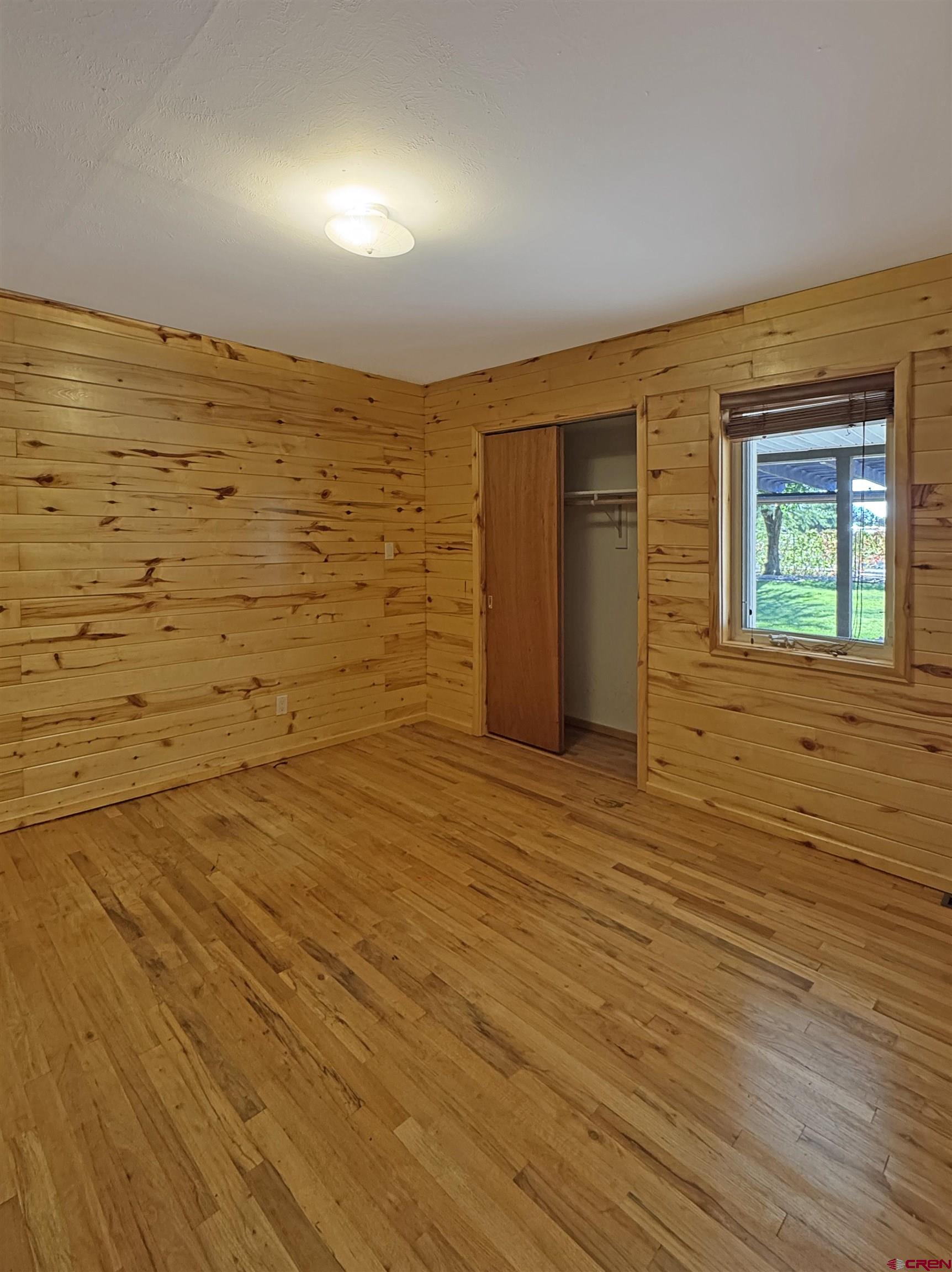 219 Edith Street Cortez, CO 81321 - Photo 15 of 29 wooden floor in an empty room