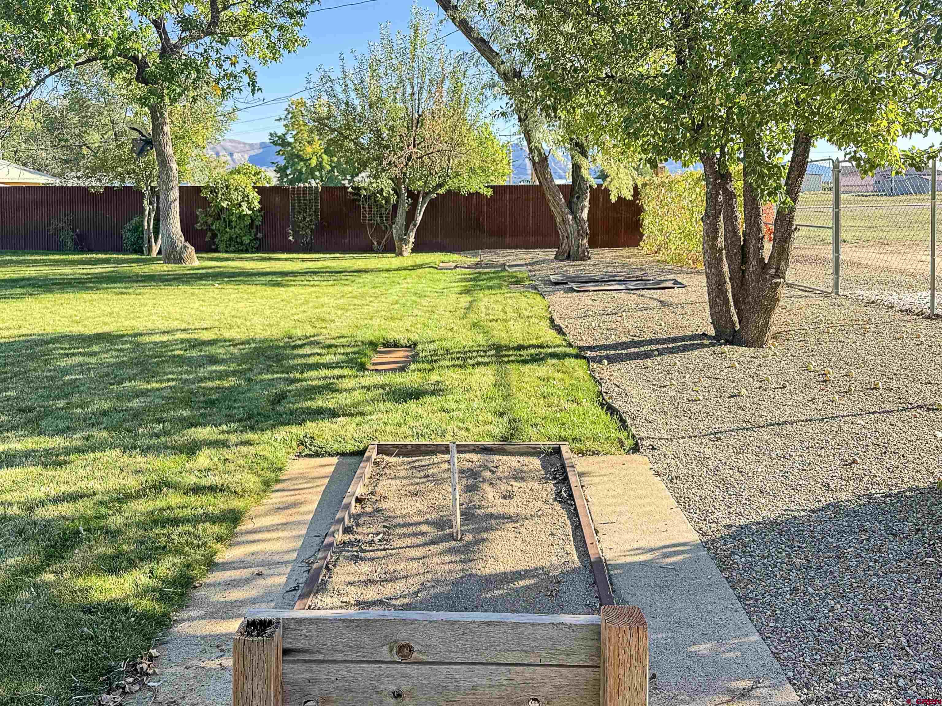 219 Edith Street Cortez, CO 81321 - Photo 26 of 29 a view of a swimming pool with a patio