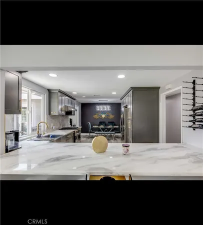 a view of a living room and dining room