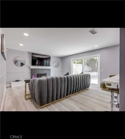 a view of kitchen with furniture and a window